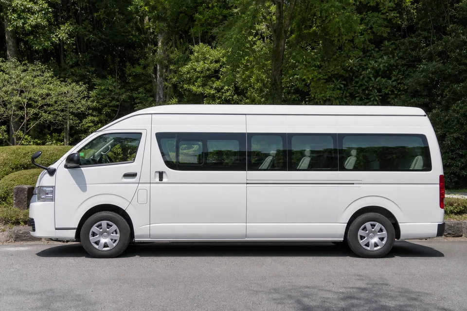 14-seat Hiace or equivalent